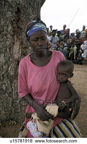Stock Photo - malnourished, child, womanand, ghana, person, people. Fotosearch