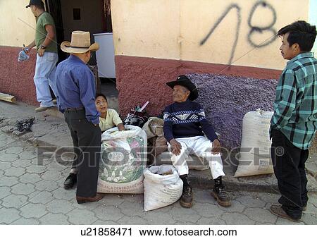 Stock Image - market, person, chatting, men, guatemala, people. Fotosearch