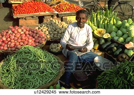 Stock Photography - market, sells, street, fruits, vegetables, vender. Fotosearch