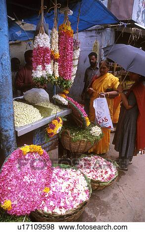 Stock Photo - markets, people, india, 5309, person, flower. Fotosearch
