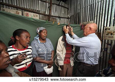 Stock Image - maryknoll, hand, american, kenya, person, people. Fotosearch