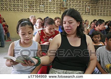 Stock Photo - mass, person, catholic, congregation, honduras, people. Fotosearch