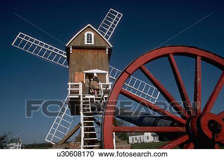 Stock Image - mill, red, wye, wheel, wooden, windmill. Fotosearch
