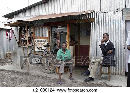 Picture - mukuru, person, shops, small, kenya, people. Fotosearch