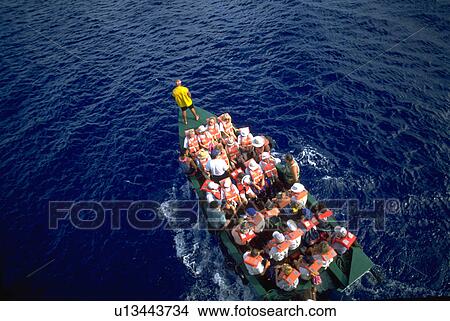 navigating, boat, tourists, passengers, full, water View Large Photo Image Picture - navigating, boat, tourists, passengers, full, water. Fotosearch