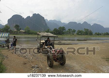 ngung, person, nam, tractor, laos, people View Large Photo Image Stock Photo - ngung, person, nam, tractor, laos, people. Fotosearch