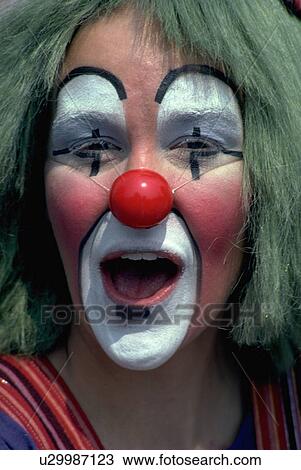 Stock Image - nose, girl, facepaint, funny, happy, clown. Fotosearch