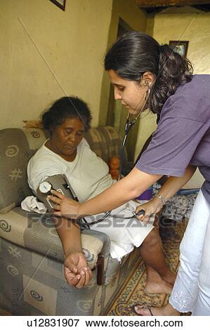 Stock Photo - nurse, people, brazil, person, hand, woman. Fotosearch
