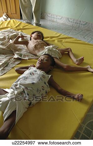Stock Photo - orphanage, person, babies, sick, cambodia, people. Fotosearch