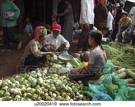 Stock Photo - outdoor, person, seller, vegetable, cambodia, people. Fotosearch