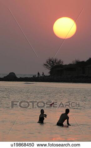 palolem, person, sunset, india, sun, people View Large Photo Image Stock Image - palolem, person, sunset, india, sun, people. Fotosearch