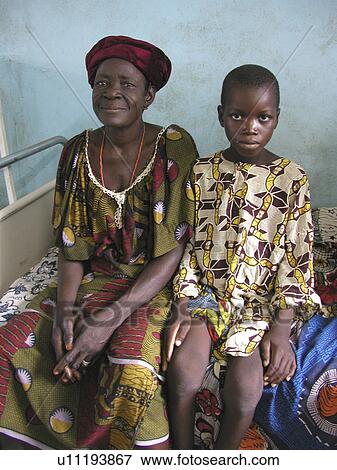 Stock Photo - parakou, people, boy, benin, person, woman. Fotosearch