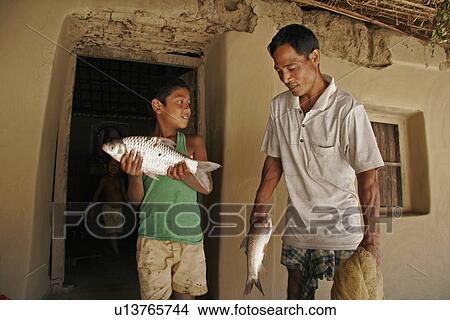 Picture - people, children, fish, person, food. Fotosearch