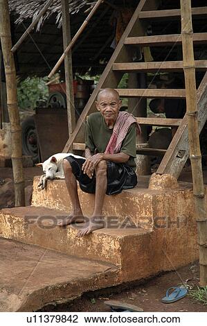 Stock Image - people, kampong, cambodia, person, dog. Fotosearch