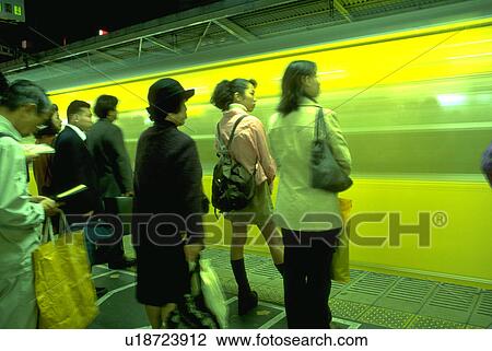 Stock Image - people, train, waiting, japanese, business. Fotosearch