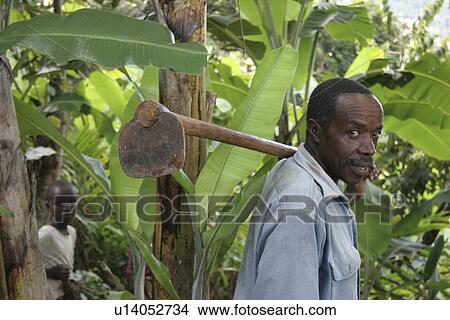 Picture - person, carrying, male, tanzania, people. Fotosearch