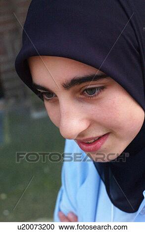 Stock Image - portrait, girl, head, covered, islam, moslem. Fotosearch