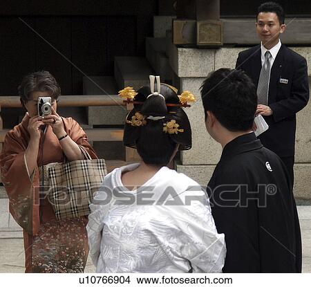 pose, person, groom, bride, japan, people View Large Photo Image Picture - pose, person, groom, bride, japan, people. Fotosearch