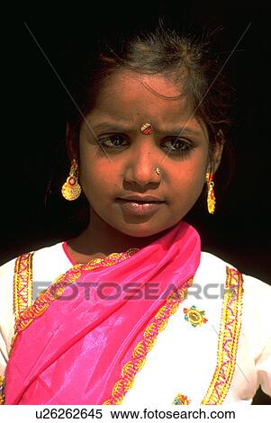 Stock Photography - poses, child, earrings, gold, kid, small. Fotosearch