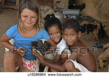 puppy, person, kids, brazil, children, people View Large Photo Image Picture - puppy, person, kids, brazil, children, people. Fotosearch