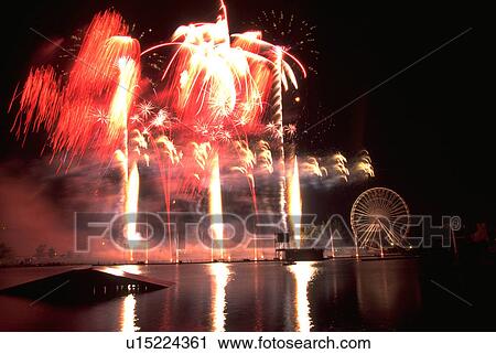 Stock Image - pyrotechnics, fireworks, canada, montreal, display, water. Fotosearch