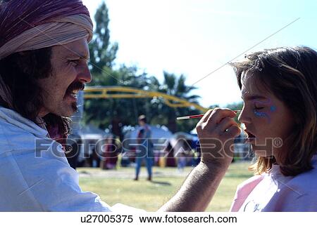 Stock Photography - released, gypsy, girl, painting, model. Fotosearch