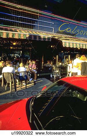 Stock Image - restaurant, car, italian, north, people, beach. Fotosearch