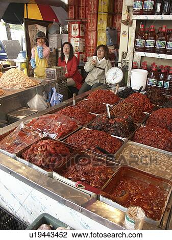 Stock Image - sale, people, kimchee, korea, person, food. Fotosearch