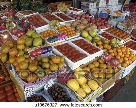 Stock Photo - sale, people, korea, person, fruit, food. Fotosearch