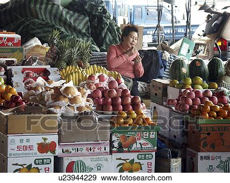 Stock Photo - sale, people, korea, person, fruit, food. Fotosearch