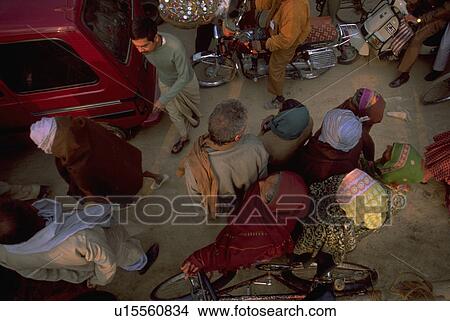 scooter, hindu, motorcycle, bicycle, worshipers, car View Large Photo Image Picture - scooter, hindu, motorcycle, bicycle, worshipers, car. Fotosearch