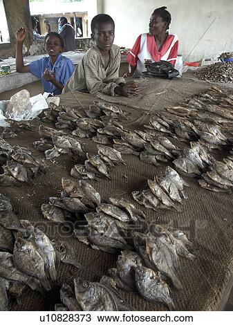 Stock Image - shop, person, small, zambia, fish, people. Fotosearch