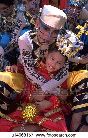 Stock Photo - sinulog, party, hanging, female, girl, woman. Fotosearch