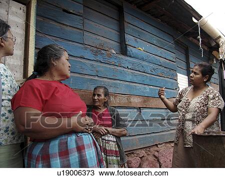 Stock Image - slum, person, visiting, neighbors, honduras, people. Fotosearch