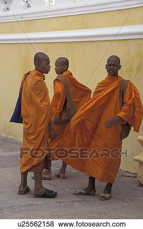 Stock Photo - standing, person, monks, buddhist, cambodia, people. Fotosearch