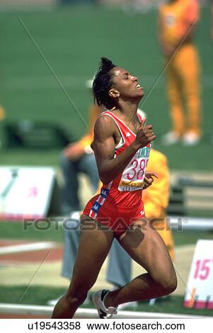 Stock Photo - strain, competiter, olympics, running, leathers, female. Fotosearch