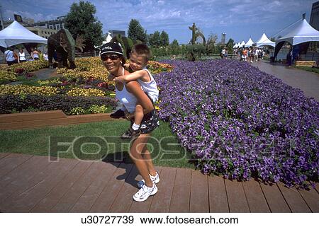 Stock Photo - sun, water, sport, child, summer, woman. Fotosearch