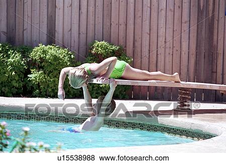 Stock Photo - swimming, kids, divingboard, playing, images, children. Fotosearch