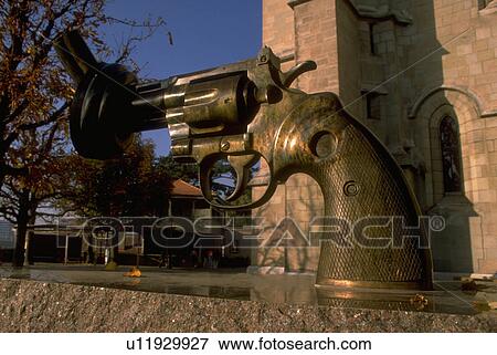 Stock Photo - switzerland, sculpture, lausanne, church, foot, revolver. Fotosearch