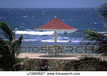 Stock Photo - table, jamaican, shore, ocean, resort, beach. Fotosearch