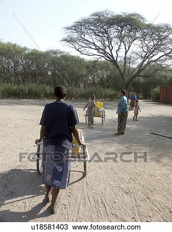 Stock Image - tanzania, people, women, person, fitness, water. Fotosearch