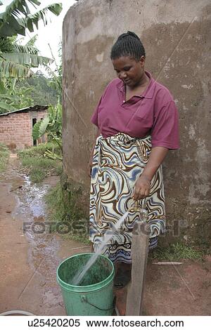 Stock Photography - tanzania, water, person, fitness, people, woman. Fotosearch