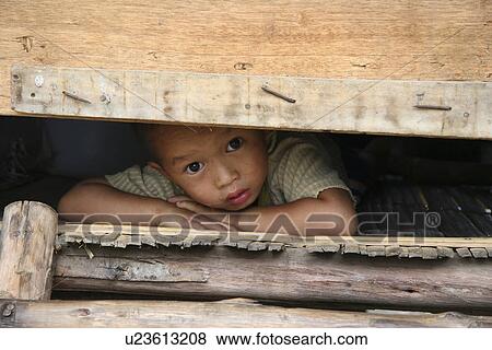 Stock Photo - thailand, child, home, kid, person, people. Fotosearch