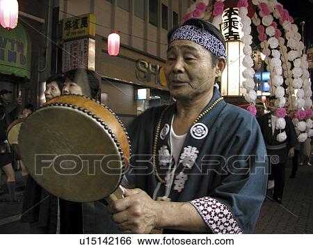 Stock Photograph - through, person, procession, buddhist, japan, people. Fotosearch