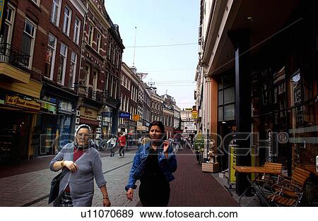 Stock Photo - town, female, old, street, walking, woman. Fotosearch