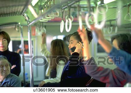 train, woman, riding, japanese, people, business View Large Photo Image Stock Photography - train, woman, riding, japanese, people, business. Fotosearch