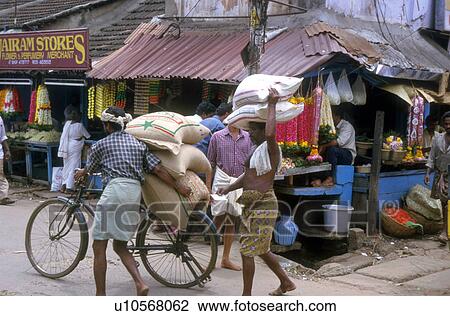 Stock Image - transportation, people, india, 5229, person, food. Fotosearch
