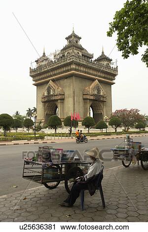 Stock Image - triomphe, person, arc, patuxai, laos, people. Fotosearch
