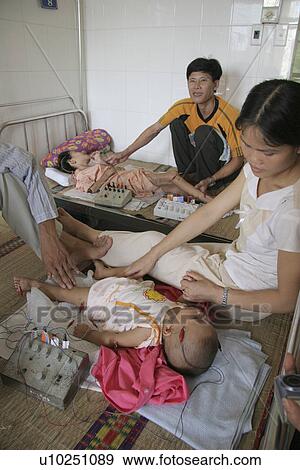Stock Photo - vietnam, hand, kid, person, child, people. Fotosearch