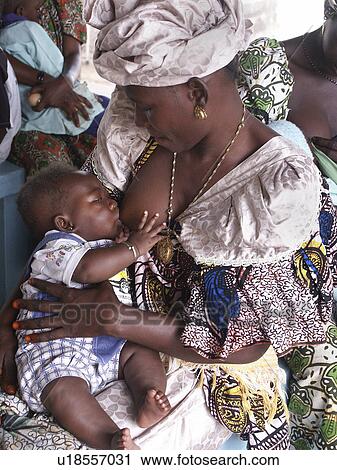 Stock Image - waiting, baby, gambia, person, people, woman. Fotosearch
